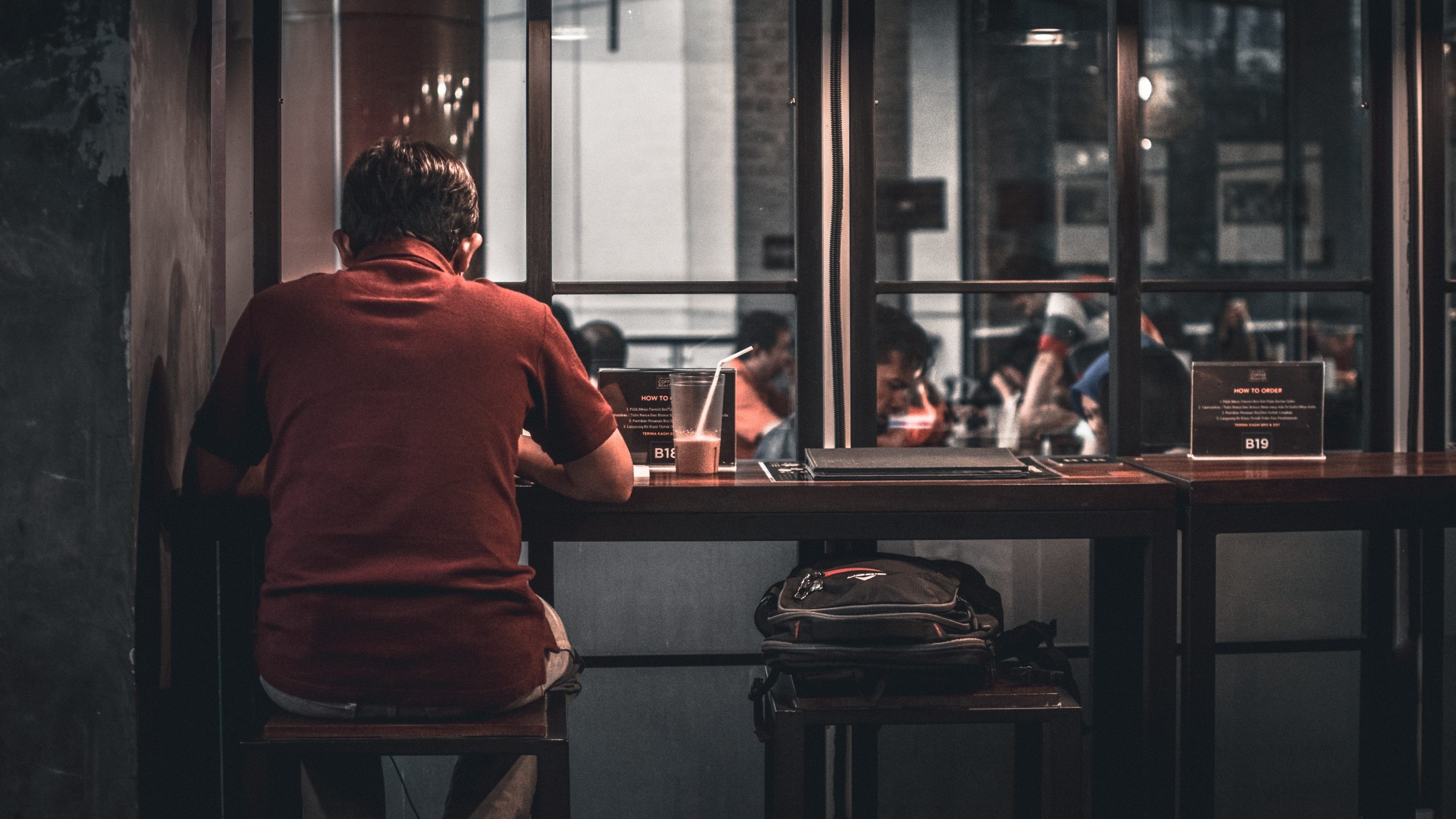 man eating alone