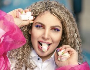 woman eating candy