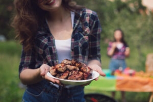 parent with plate of meat