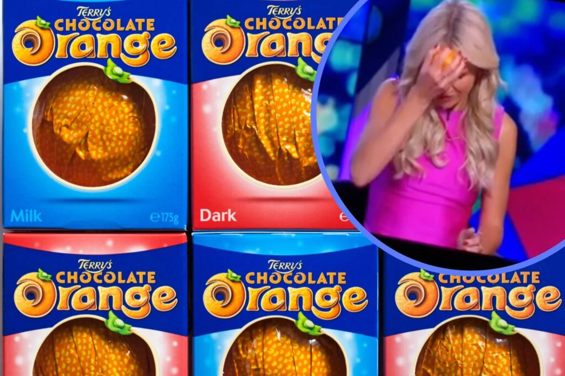New Zealand TV presenter smashes Terry’s Chocolate Orange on her head