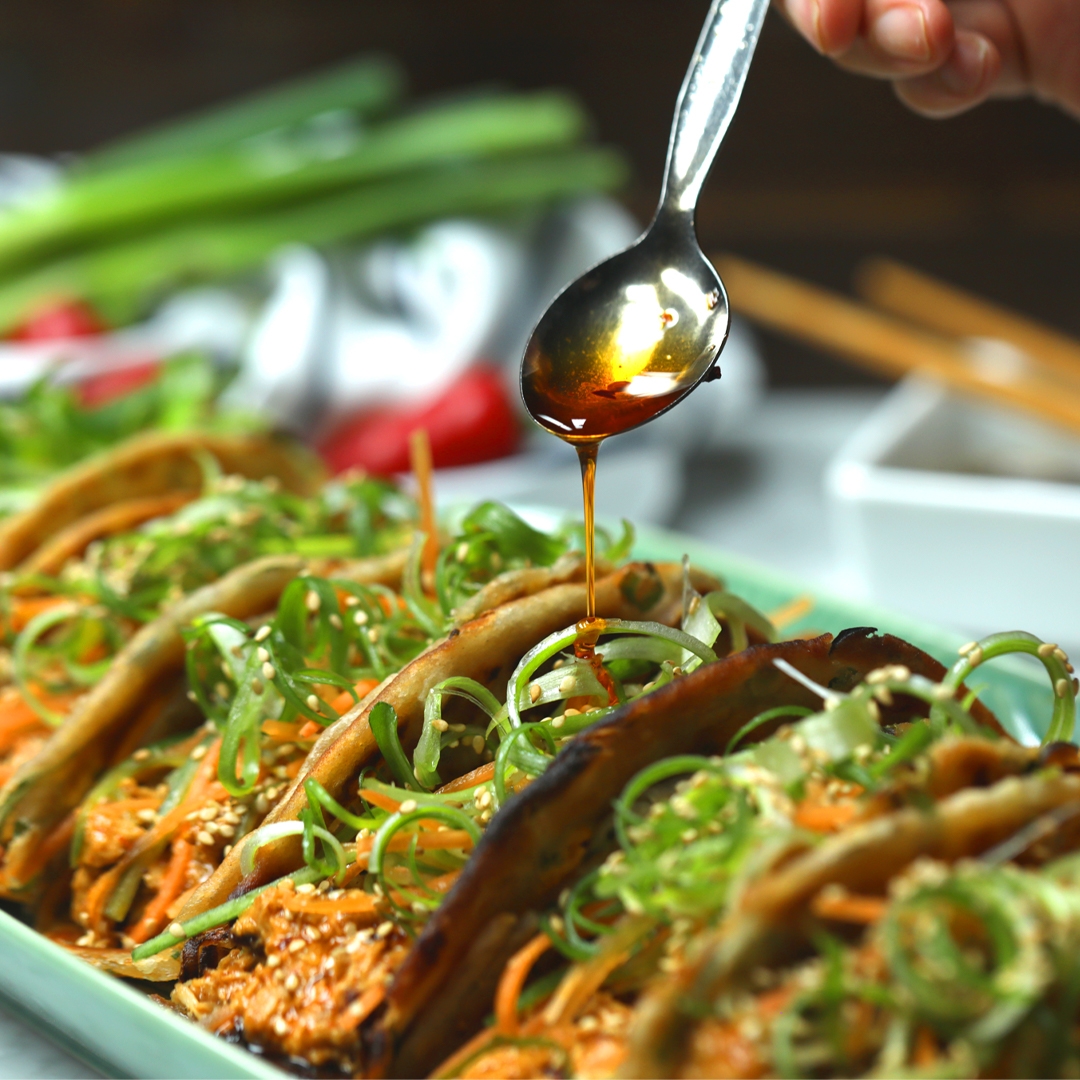 Spring Onion Pancake Tacos with Peanut Butter Pulled Chicken twisted