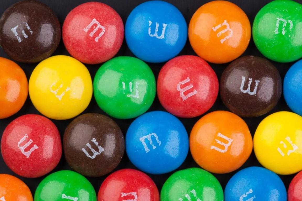 People are using M&Ms as makeup and it’s truly bizarre