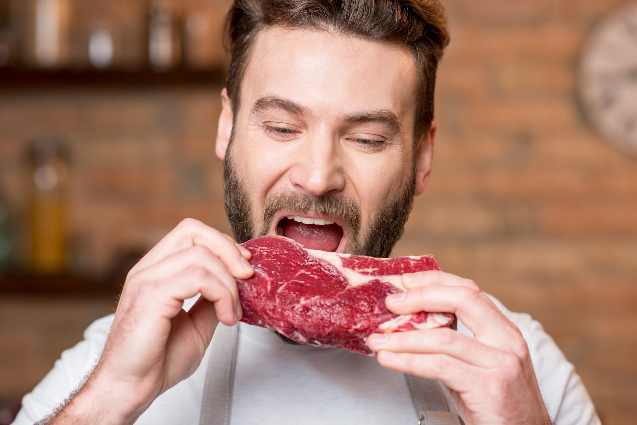 man eating meat manly study