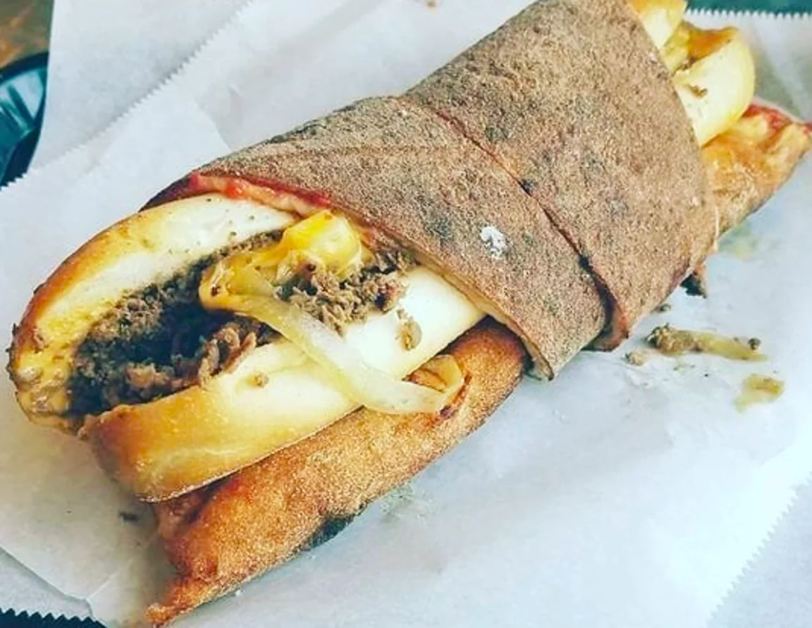 The ‘Philly Taco’ is a cheesesteak wrapped up in a giant pizza slice