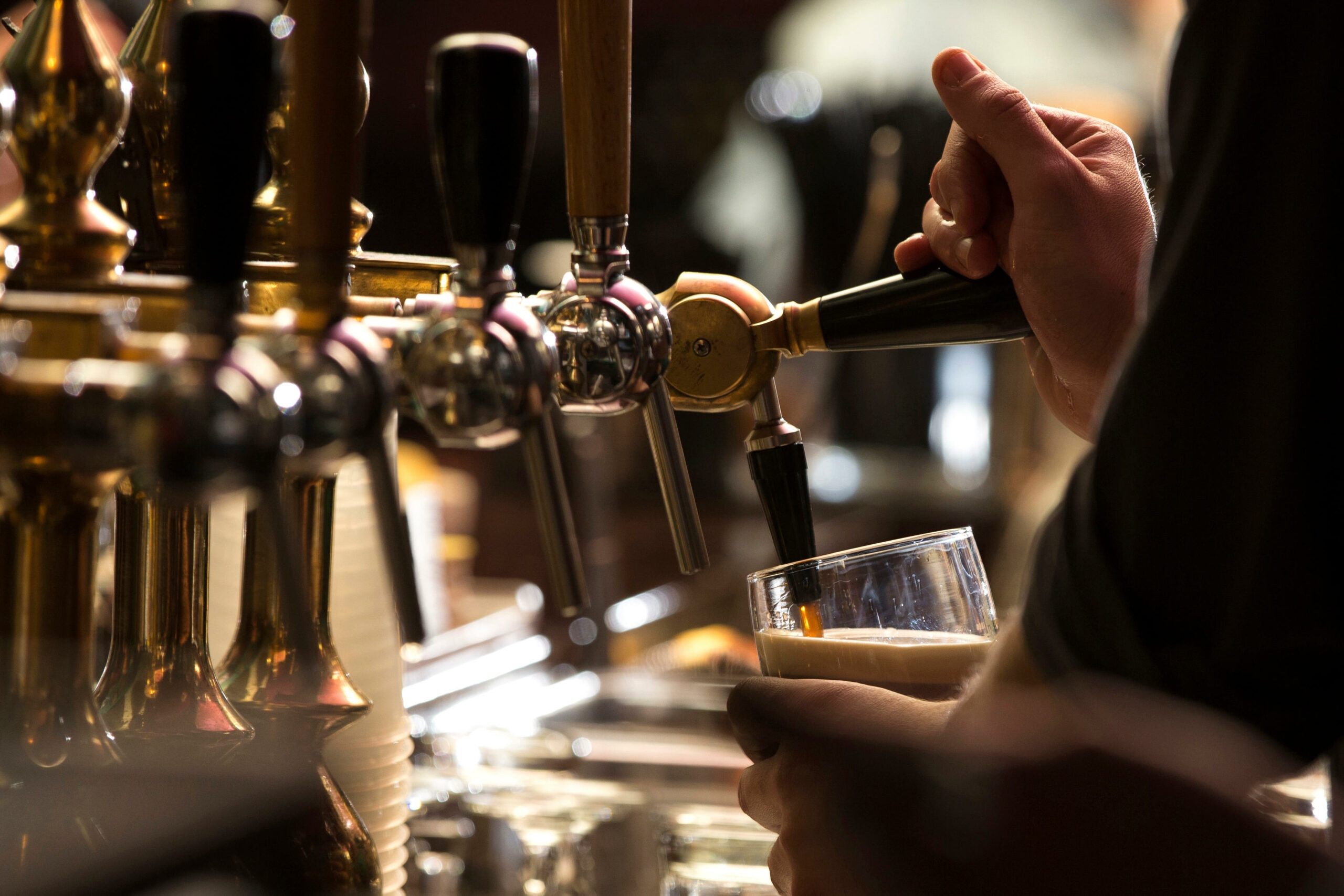 Pouring a pint in the pub